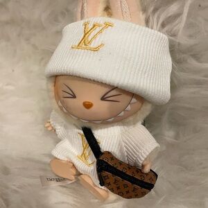 Doll not included. Only set of clothes and 2 bags. Brand new .